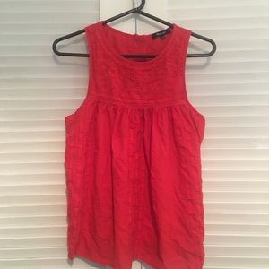 Red sleeveless blouse from Madewell